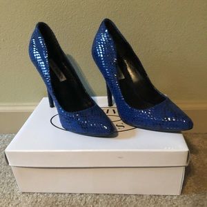 Snake skin pumps
